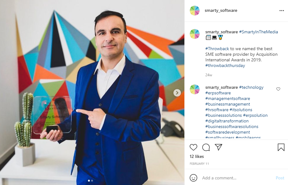 Screenshot of Smarty Software's Instagram showing Doctor Farhad Reyazat in a blue suit. He is stood in front of a wall with colourful geometric designs. He is holding an award for the Best Startup and Best Product of 2019. There is a small cactus on the desk behind him. Building an online presence.